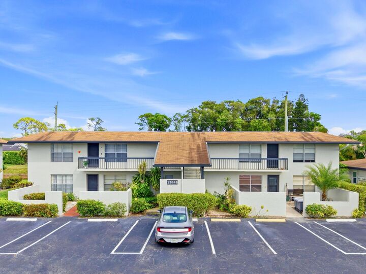 Property Photo:  13648 Coconut Palm Court A  FL 33484 