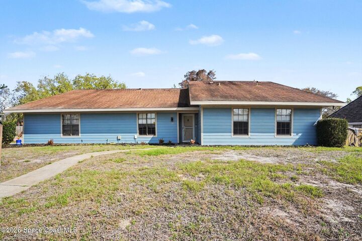 Property Photo:  2555 Kumquat Street NE  FL 32905 