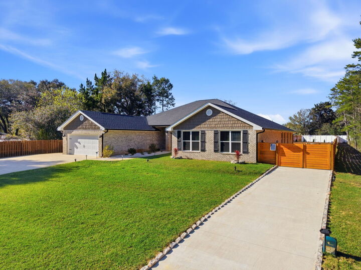 Property Photo: 6968 Gandy Drive FL 32566