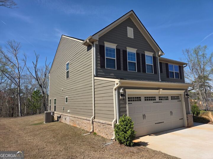 Property Photo:  1029 Climbing Rose Way  GA 30253 