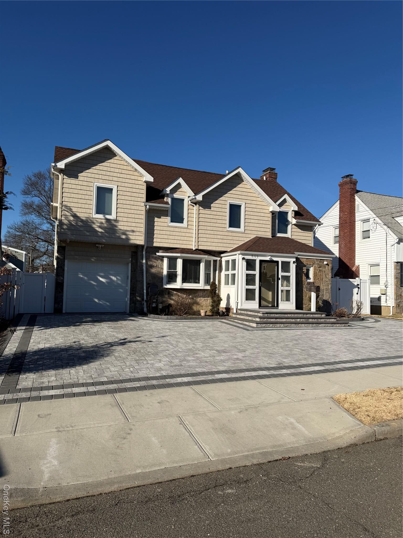 Property Photo:  869 De Mott Avenue  NY 11510 