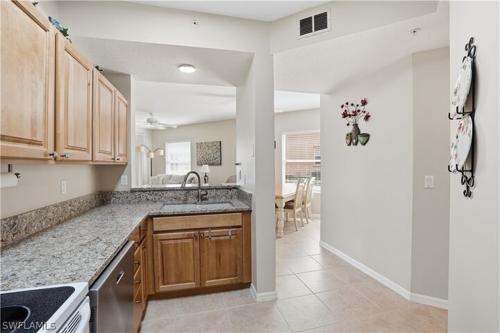 Property Photo: 6560 Huntington Lakes Circle 104 FL 34119