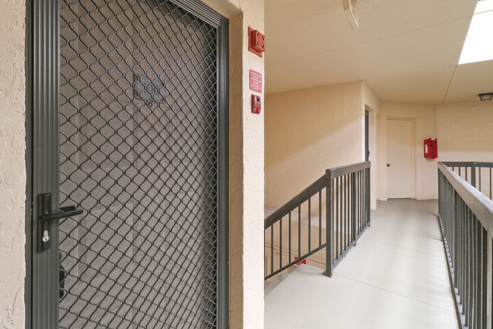 Property Photo: 1999 NE Collins Circle 3-100 FL 34957