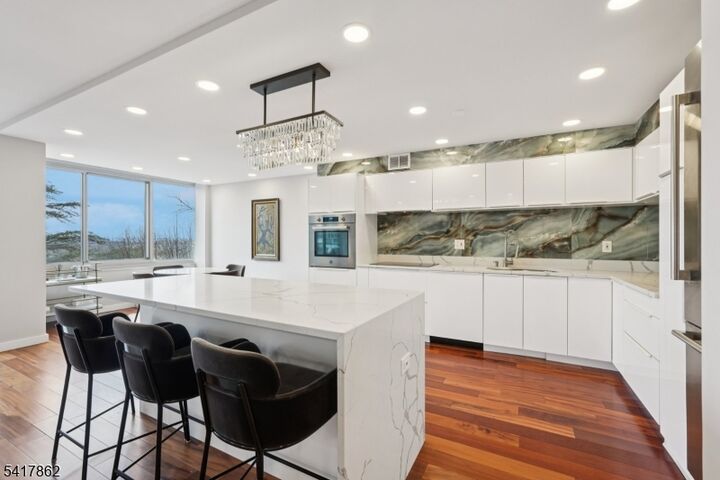 Property Photo:  1 Claridge Dr 104  NJ 07044 