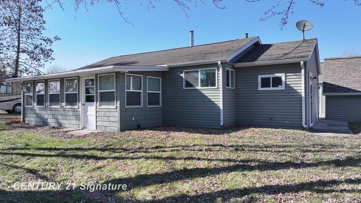 Property Photo:  1202 Janice Lane  MI 48612 