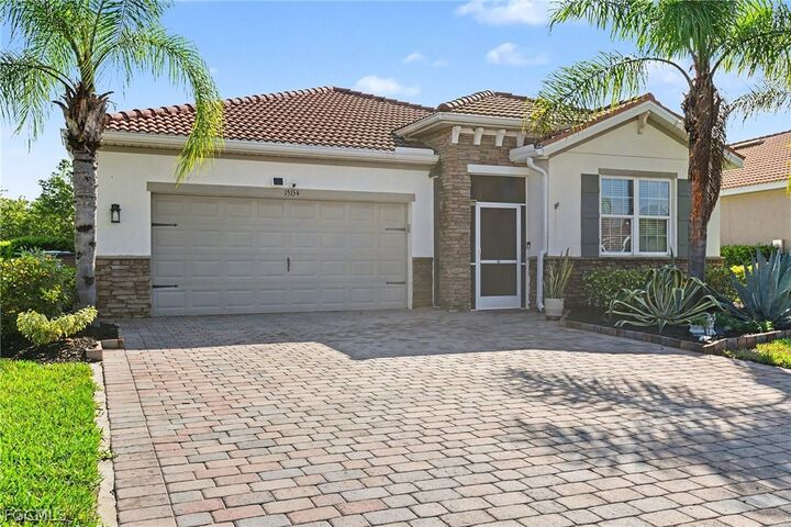 Property Photo:  15154 Yellow Wood Drive  FL 33920 