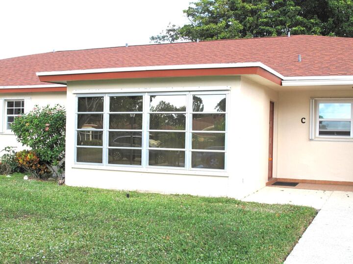 Property Photo: 325 NW 50th Avenue C FL 33445