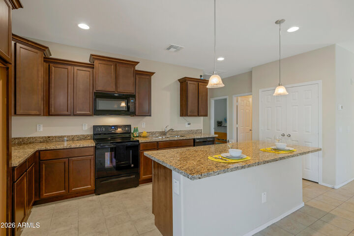 Property Photo:  6168 W Freeway Lane  AZ 85302 