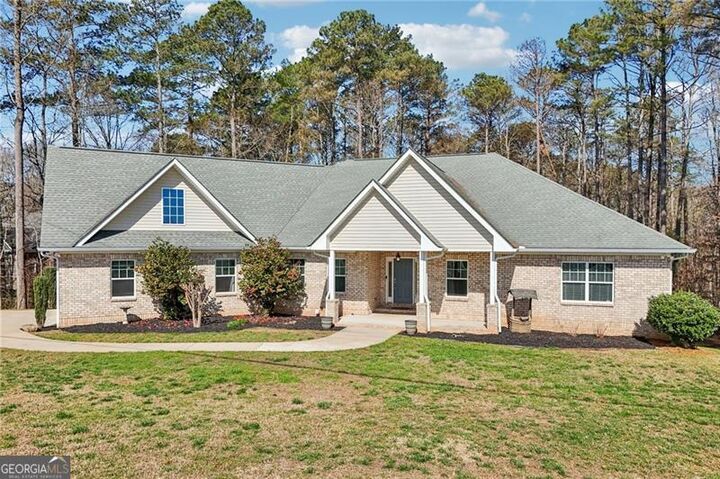 Property Photo:  7055 Bannister Road  GA 30028 