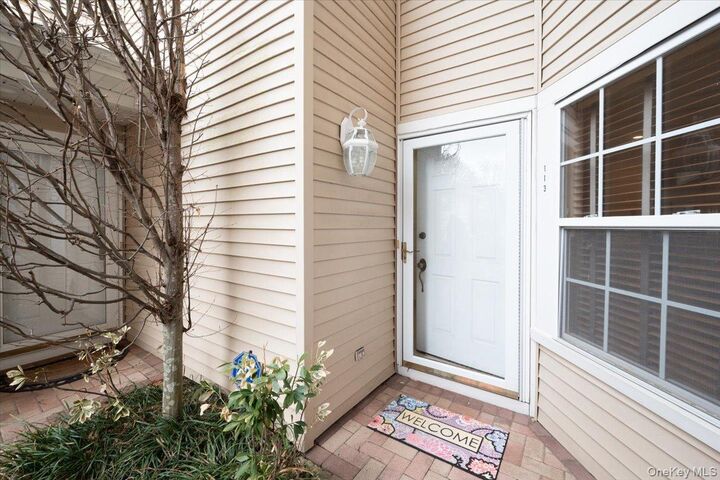 Property Photo:  113 Windwatch Drive  NY 11788 