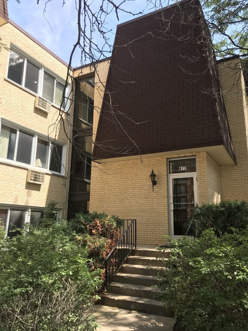 Property Photo:  677 S River Road 2C  IL 60016 