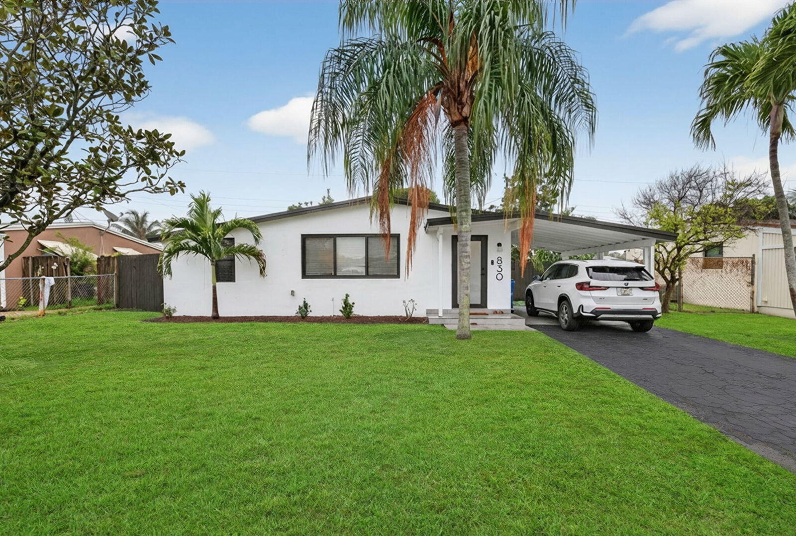 Property Photo:  830 NE 59th Court  FL 33334 