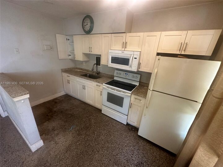 Property Photo:  1271 NE 32nd St A  FL 33334 