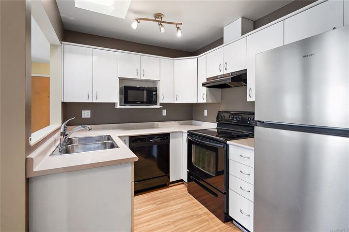 Property Photo:  9861 Fifth St 305  BC V8L 2X5 