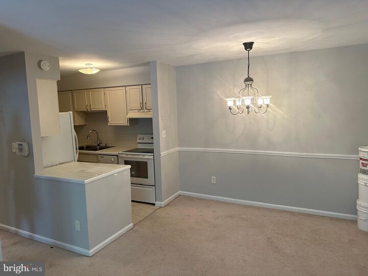 Property Photo:  5911 Prince James Drive E 25  VA 22152 