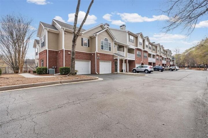 Property Photo:  7104 Woodland Lane  GA 30009 