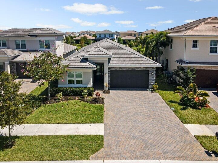 Property Photo: 1362 Harvester Crossing FL 33470