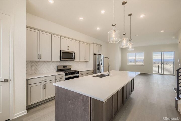 Property Photo:  6273 N Jebel Street  CO 80019 