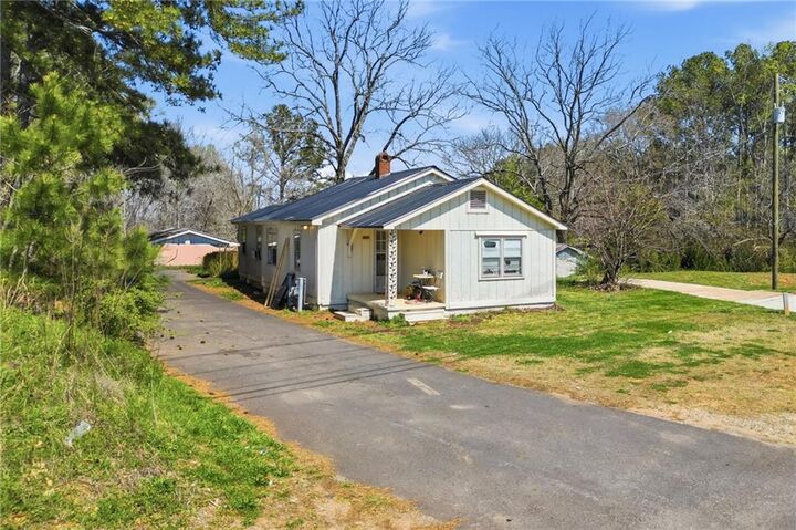 Property Photo:  3823 Cumming Highway  GA 30115 