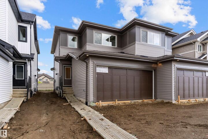 Property Photo: 1050 Cristall Crescent SW AB T6W 5S6