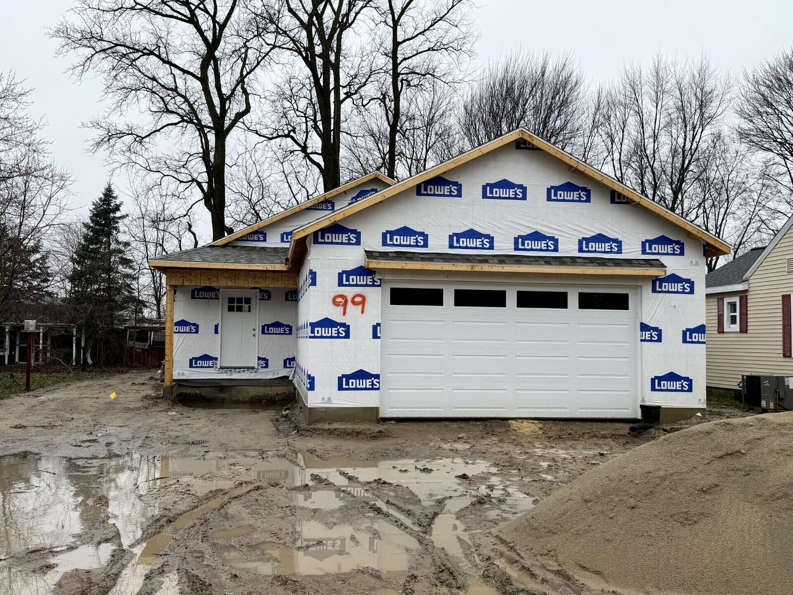 Property Photo:  99 River Street  MI 49404 