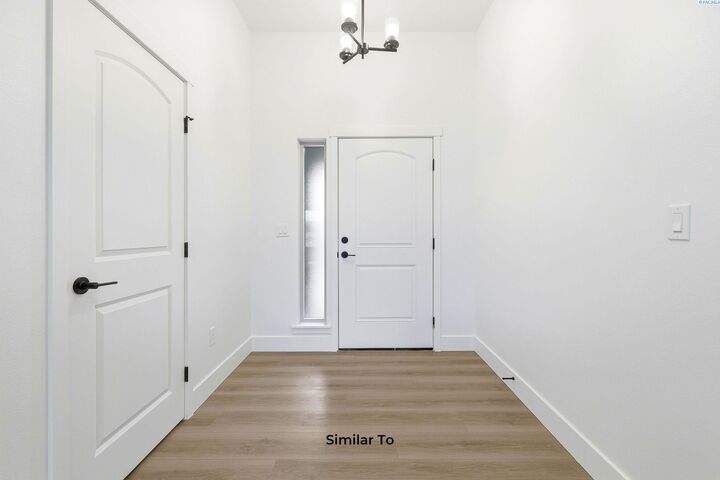 Property Photo: 10015 Redbud Dr (Phase 1 Lot 20) WA 99301