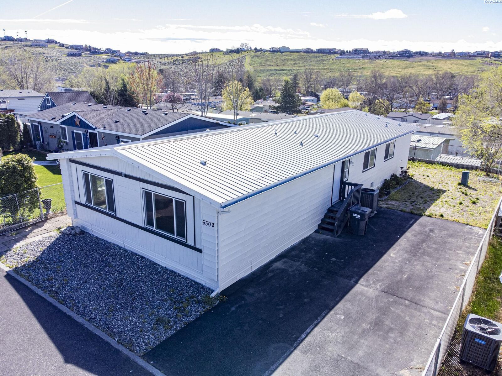 Property Photo: 6509 James St 643 WA 99353