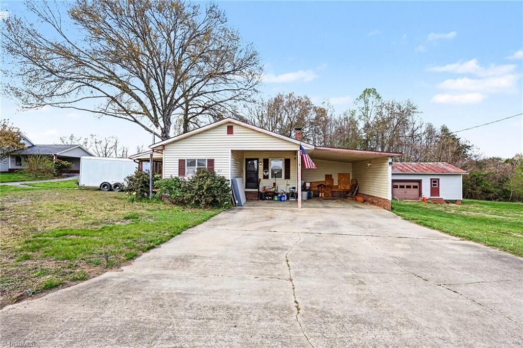 Property Photo:  1817 Amostown Road  NC 27046 