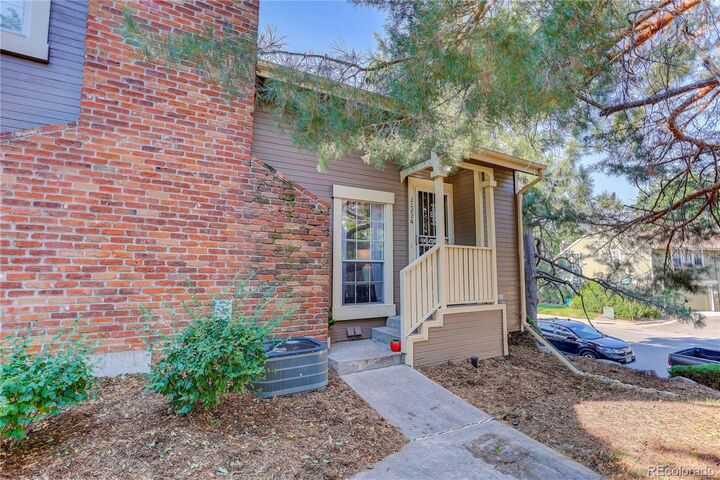 Property Photo:  2082 S Helena Street A  CO 80013 