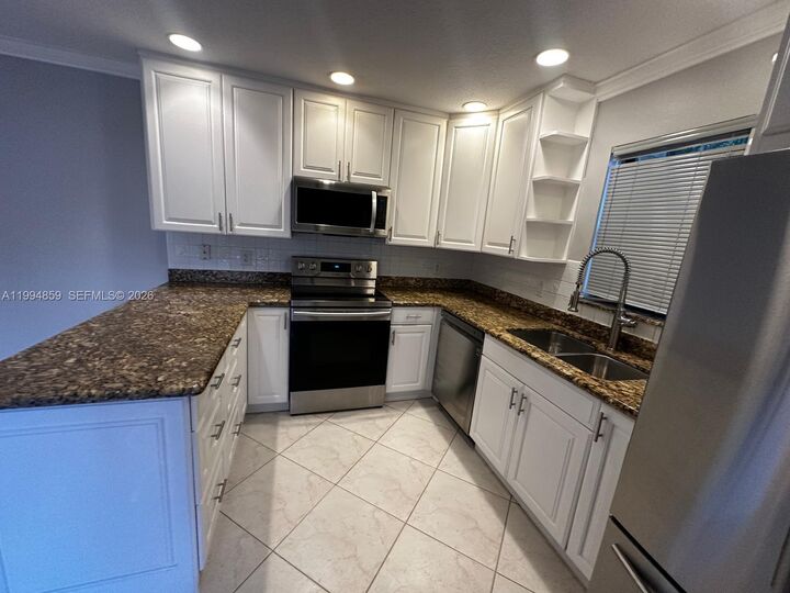 Property Photo: 7671 W Courtyard Run W FL 33433