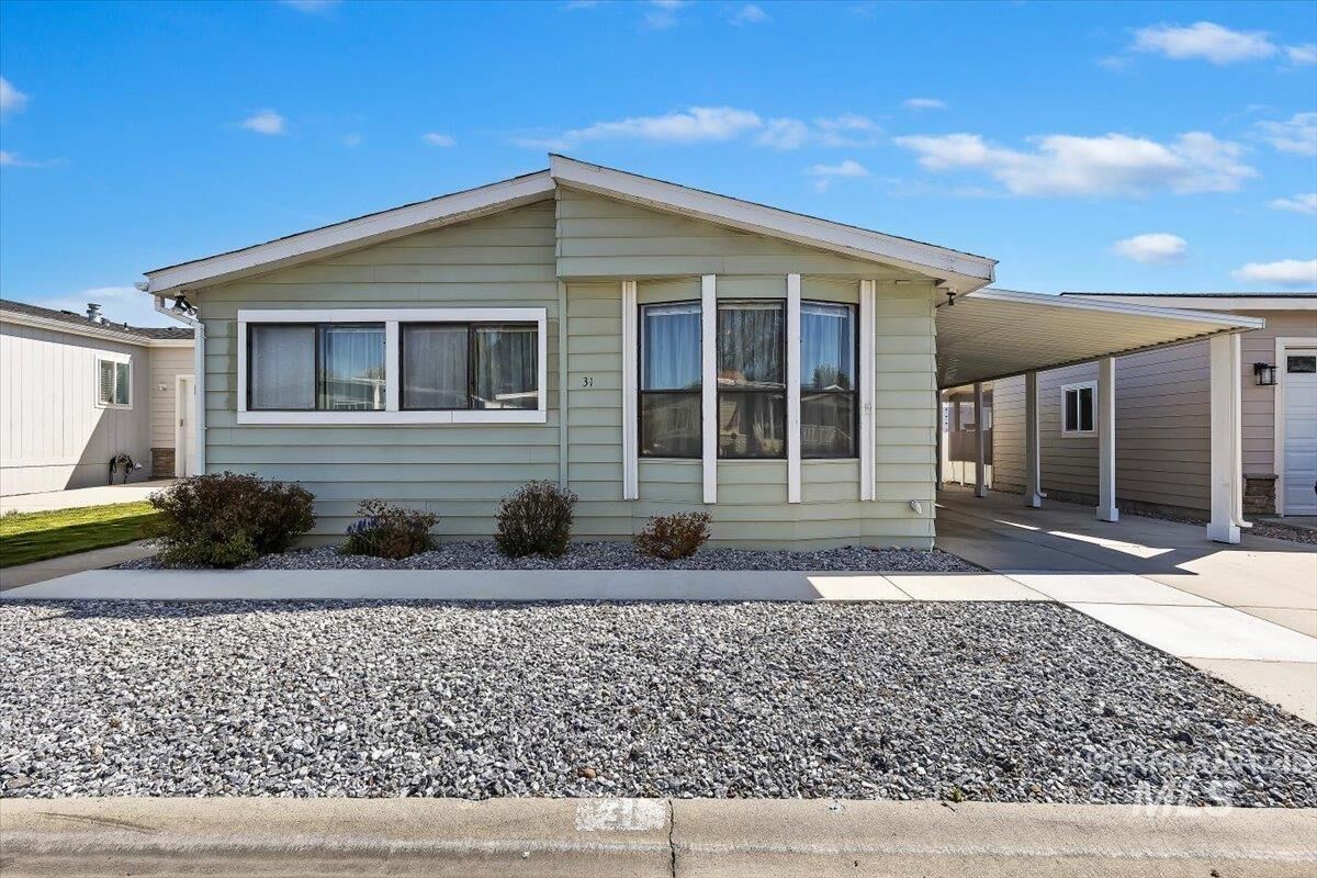 Property Photo:  9390 Ustick Rd 31  ID 83704 