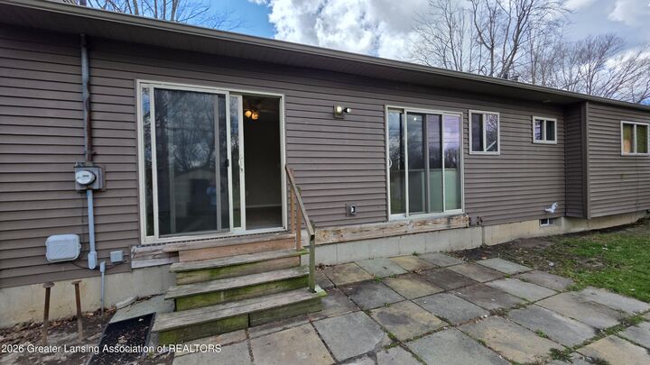 Property Photo:  3636 Coachlight Common Street  MI 48911 