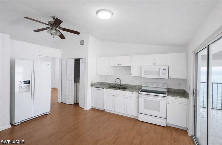 Property Photo: 5424 16th Place SW C3 FL 34116