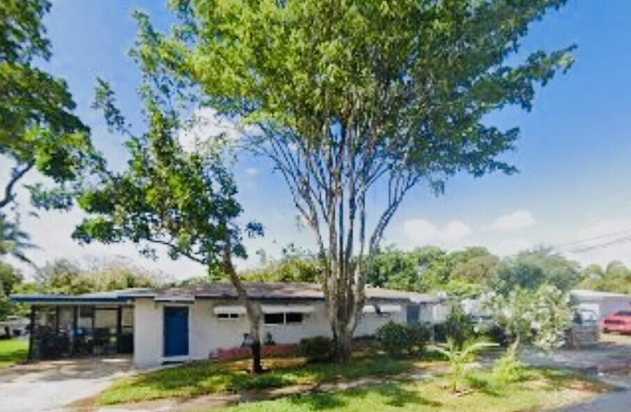 Property Photo:  721 NE 12th Avenue 1-2  FL 33060 