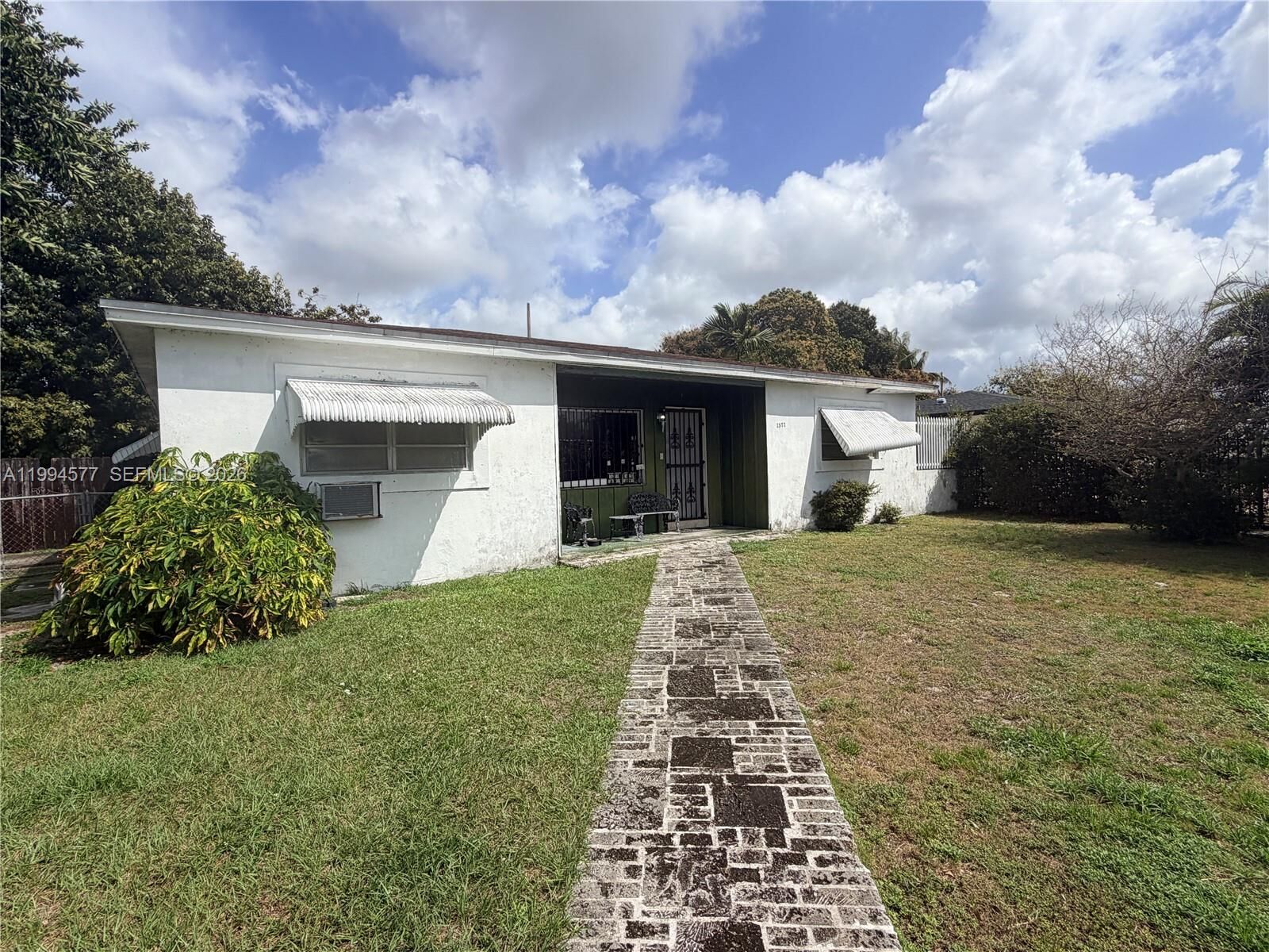 Property Photo:  1571 NW 132nd St  FL 33167 