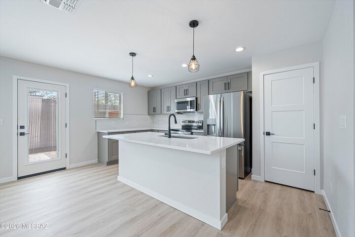 Property Photo:  739 N Queen Avenue 1  AZ 85705 