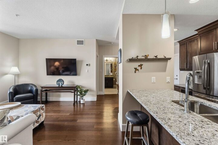 Property Photo: 11080 Ellerslie Road SW 212 AB T6W 2C2