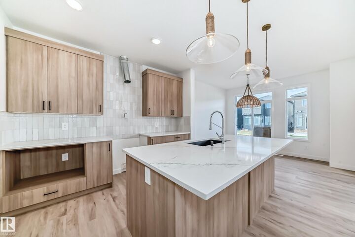 Property Photo:  4112 208 Street NW  AB T6M 3E3 