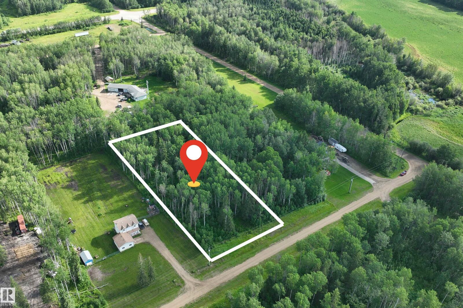 Property Photo:  Lot 5 Forest Road (RR 214)  AB T9S 1C4 