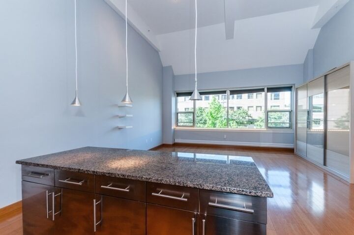 Property Photo:  290 Pleasant St 208  MA 02472 