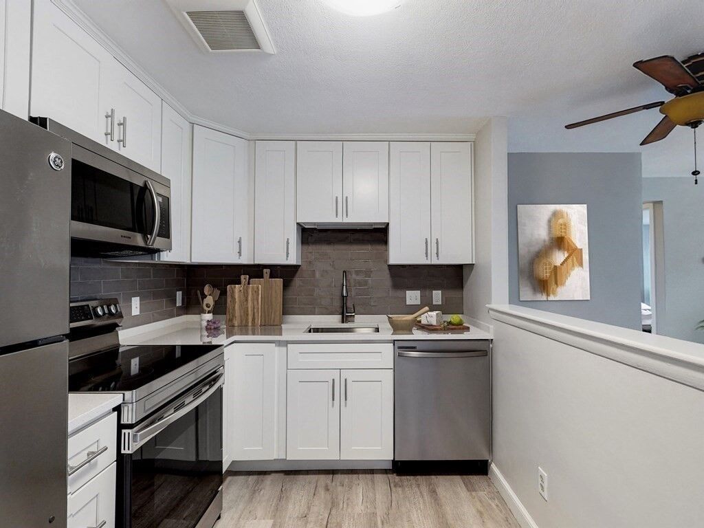 Property Photo:  1105 Lexington St 6-11  MA 02452 