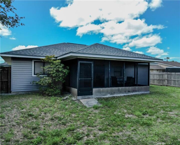 Property Photo:  8241 Harrisburg Dr  FL 33967 