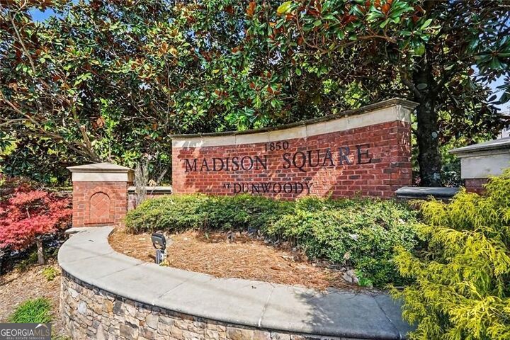 Property Photo:  1850 Cotillion Drive 1326  GA 30338 