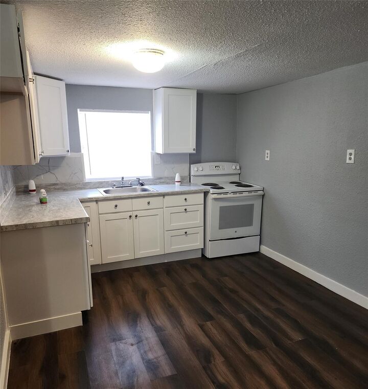 Property Photo:  211 Avenue B 1/2  TX 77568 