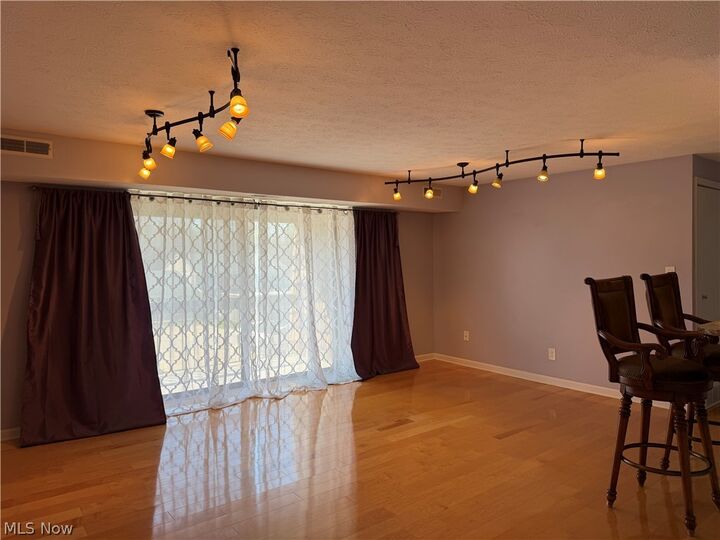 Property Photo:  9611 Sunrise Boulevard K-9  OH 44133 