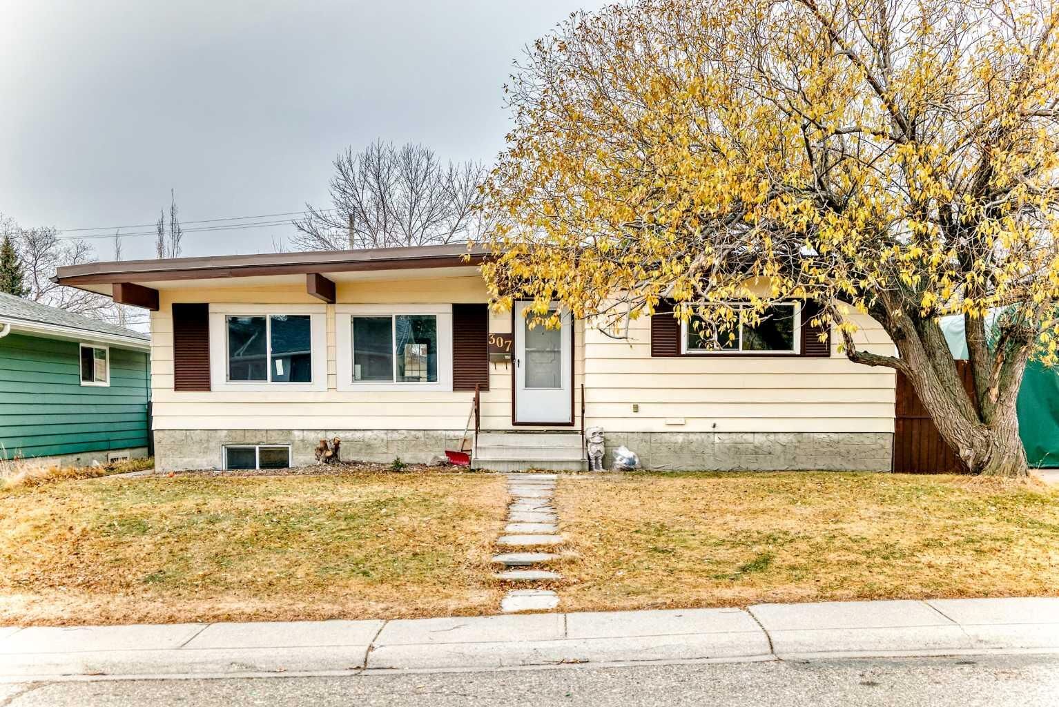 Property Photo:  307 Huntridge Road NE  AB T2K 4B8 