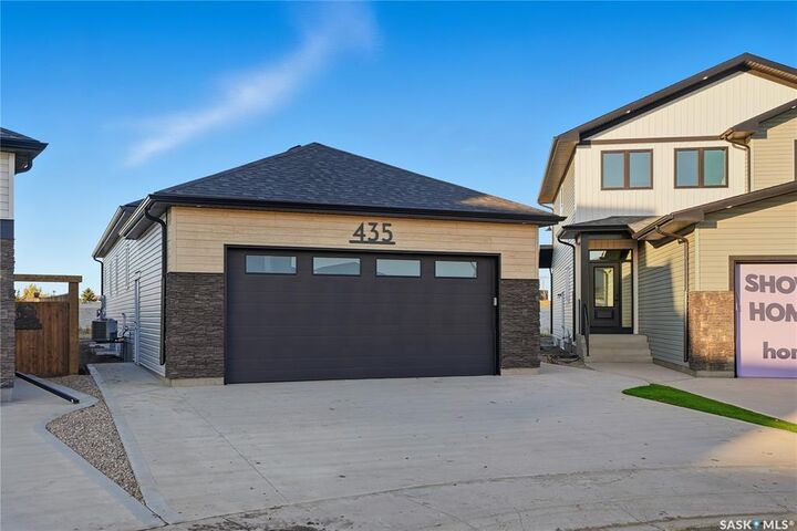 Property Photo: 151 Nazarali Way SK S7V 1P6