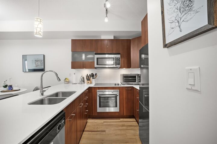 Property Photo: 13321 102A Avenue 203 BC V3T 1P6