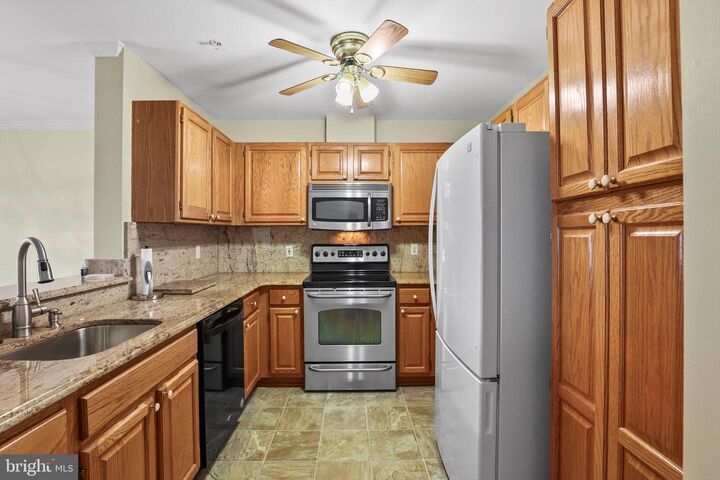 Property Photo:  4404 Silverbrook Lane E102  MD 21117 