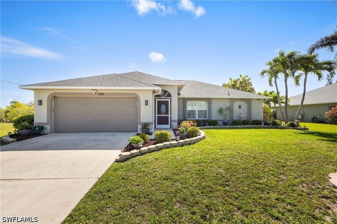 Property Photo: 1131 NW 28th Place FL 33993